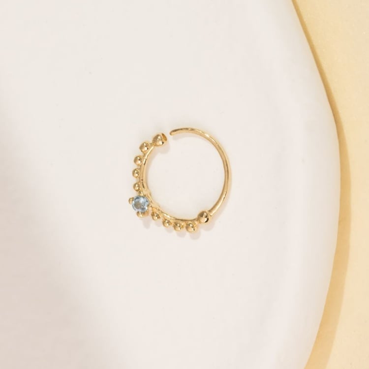 Zlatý septum piercing s akvamarínom Arla 164437