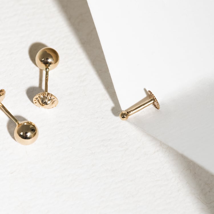 Zlatý set piercing náušníc s tyrkysom 143563