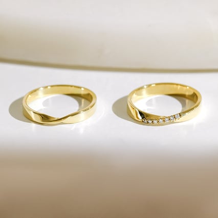 Zlaté prepletené svadobné obrúčky s diamantmi Rexanne