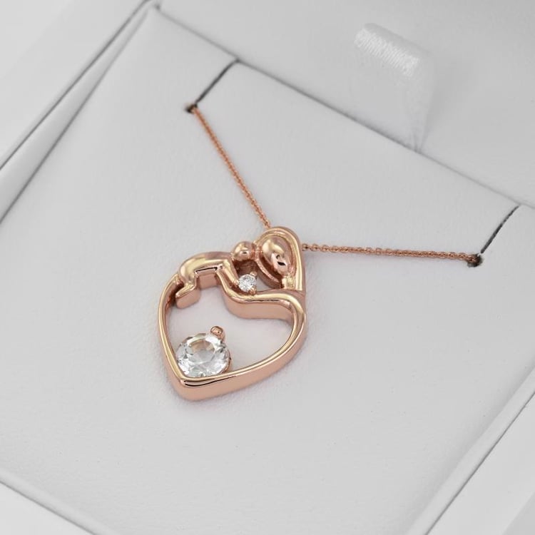 Strieborný prívesok matka a dieťa s bielym topásom a diamantom Heli 108859