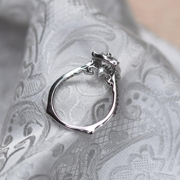 Zlatý halo prsteň s diamantom 49599