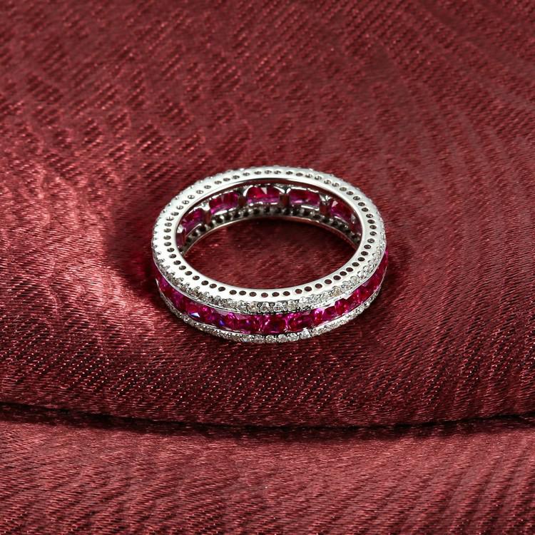 Zlatý eternity prsteň s rubínmi 5078