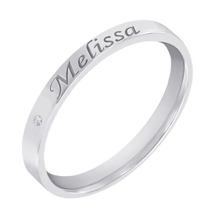 Zlatý prsteň s gravírom a diamantom