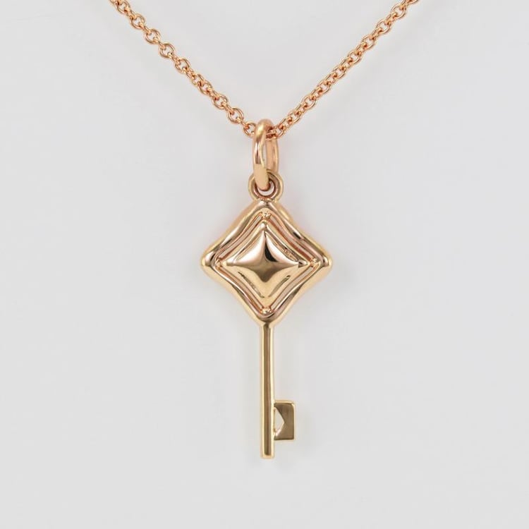 Zlatý prívesok v tvare kľúča 15318