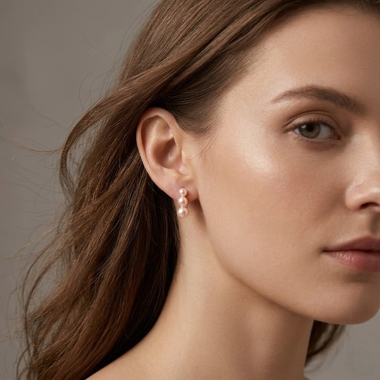 Strieborné visiace náušnice s tromi broskyňovými perlami Arielle 166379