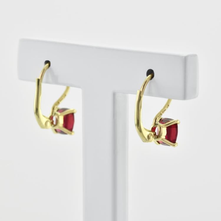 Zlaté visiace náušnice sa spinely 44589