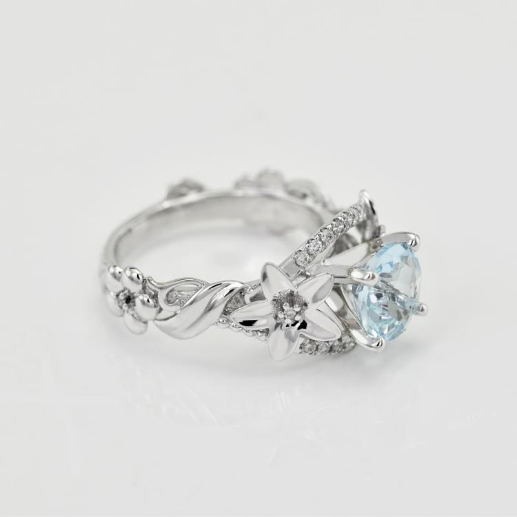 Zlatý prsteň s akvamarínom 21617