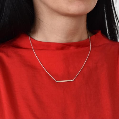 Jemný platinový náhrdelník s diamantom Charena