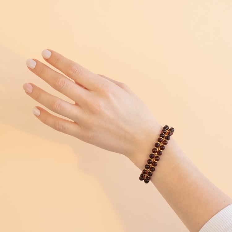 Strieborný pozlátený náramok s jantármi v tmavočerešňovej farbe Nordica 101117