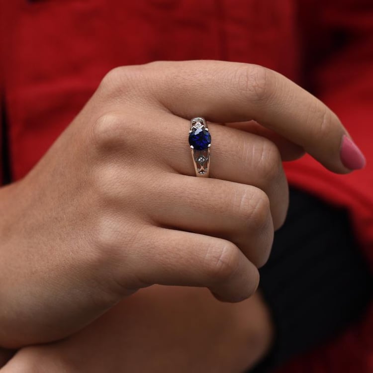 Prsteň so zafírom a zirkónmi 47968