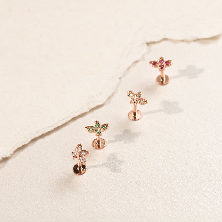 Zlatá piercing náušnica s bielymi topásmi Ciera 138296