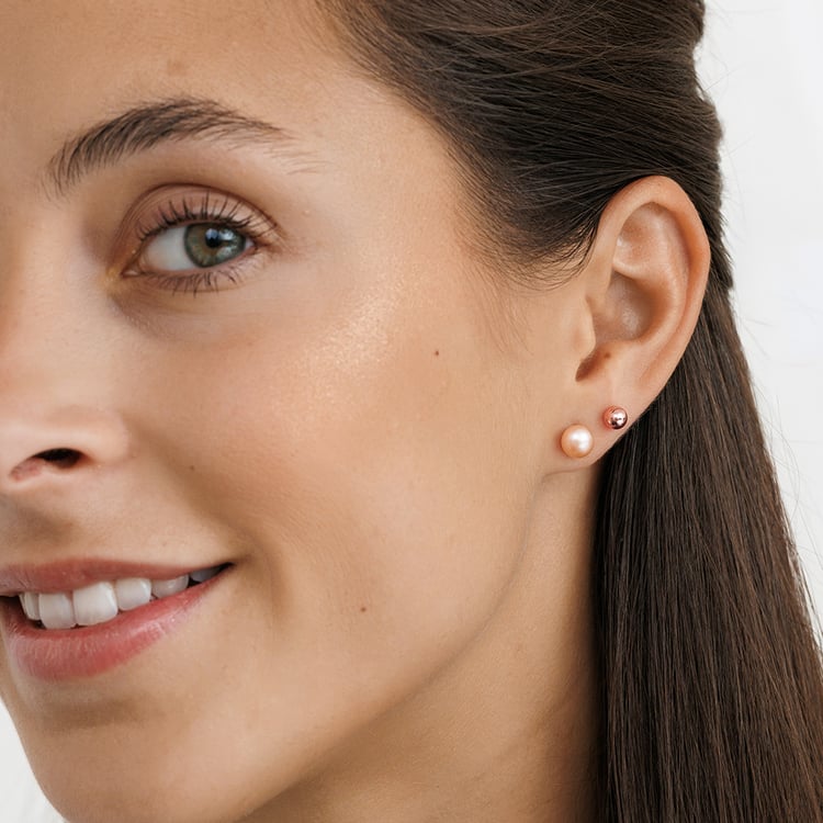 Strieborné napichovacie náušnice s broskyňovými perlami 158395