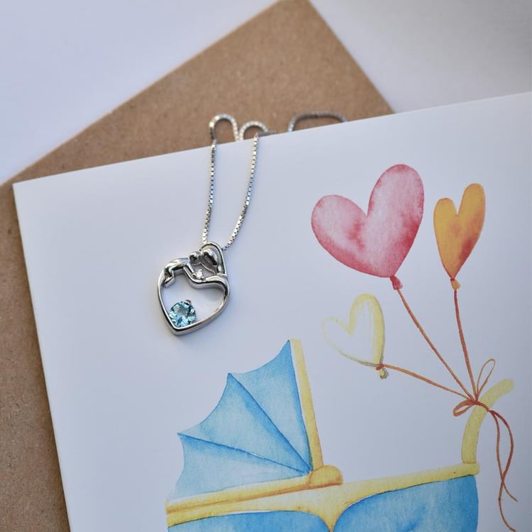 Prívesok matka a dieťa so švajčiarskym topásom a diamantom Heli 146324