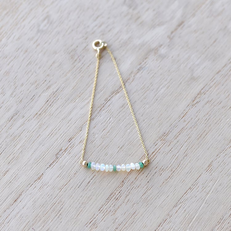 Zlatý náramok so maragdovými korálky 61946