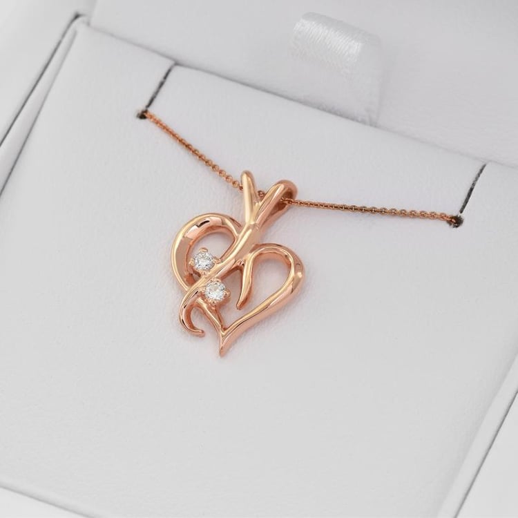 Strieborný prívesok v tvare srdca s diamantmi Elyzza 103333