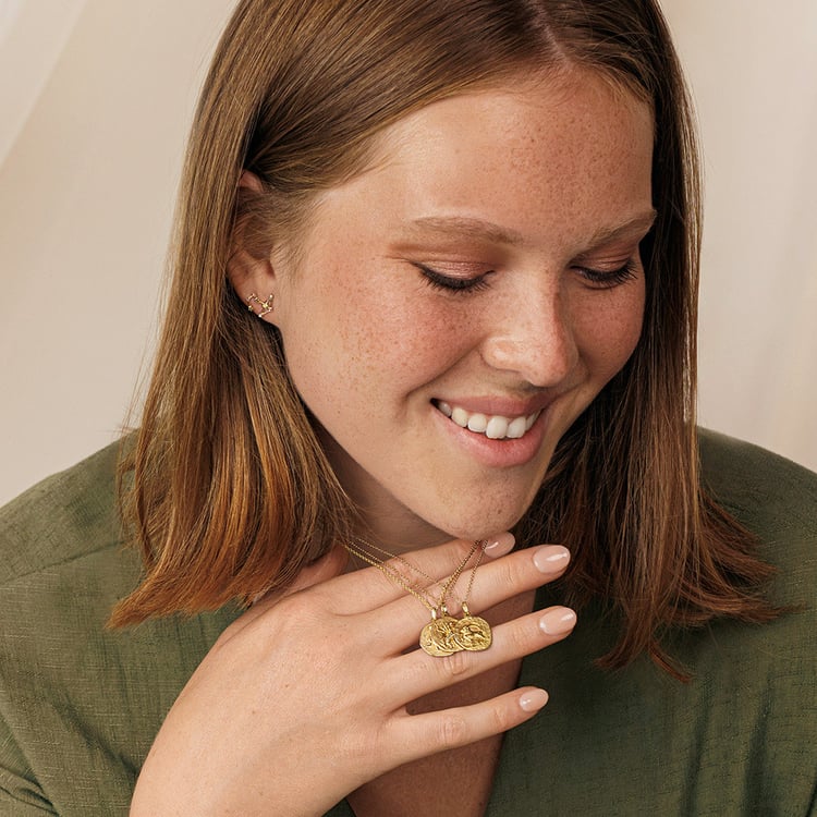 Zlatý prívesok so symbolmi znamenia zverokruhu 161310