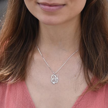 Strieborný prívesok matka a dieťa s bielym topásom Lesyd