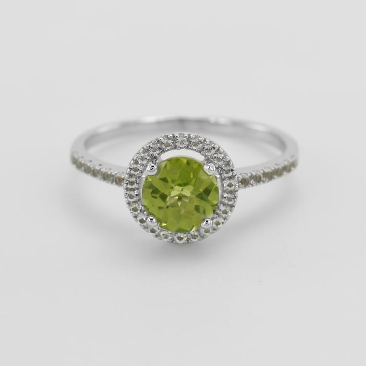 Olivín v prsteni s topásmi 51241