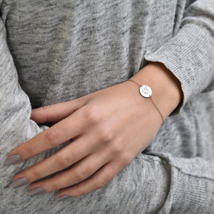 Zlatý náramok so znamením a smaragdom 37719