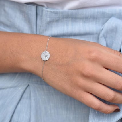 Zlatý náramok so znamením a olivínom Strelec