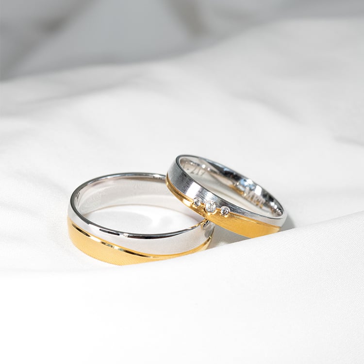 Zlaté svadobné obrúčky s tremi diamantmi Melton 125593