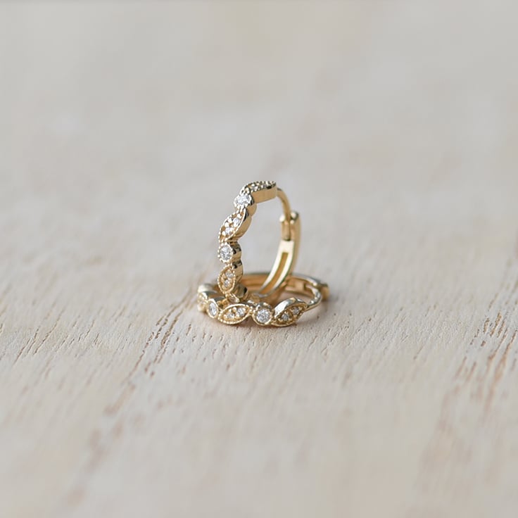 Diamanty v zlatých náušniciach 63051