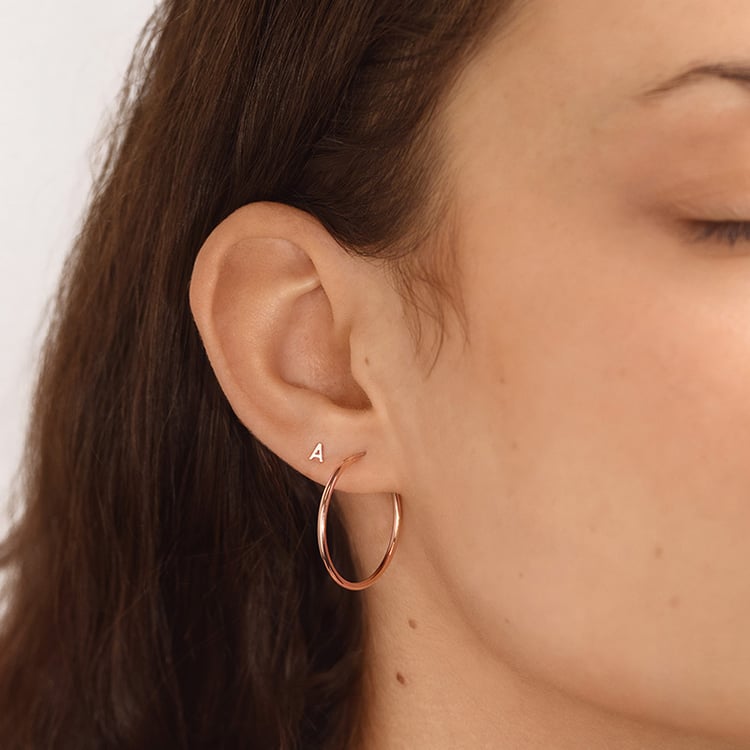 Zlatá náušnica s písmenom Alfabet 153200