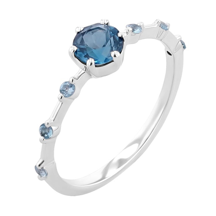 Prsteň s londýnským topásom a postrannými švajčiarskými topásmi Jelena