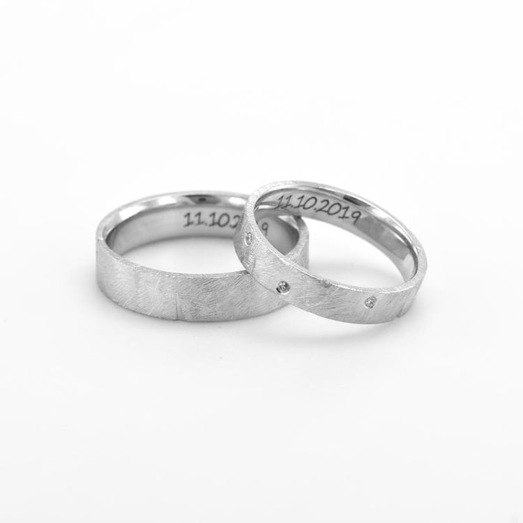 Netradičné platinové obrúčky s diamantmi 76577