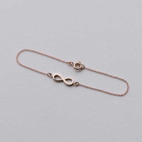 Zlatý fashion náramok s motívom nekonečna Infinity