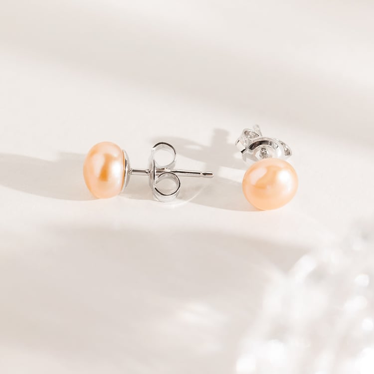 Strieborné napichovacie náušnice s broskyňovými perlami 158393