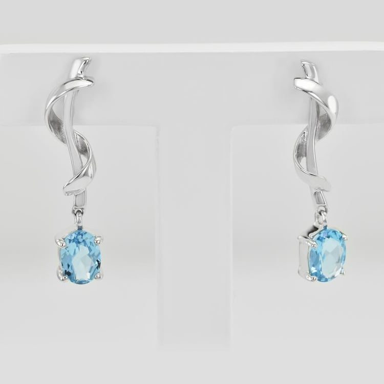 Strieborné náušnice s oválnymi topásmi 25102