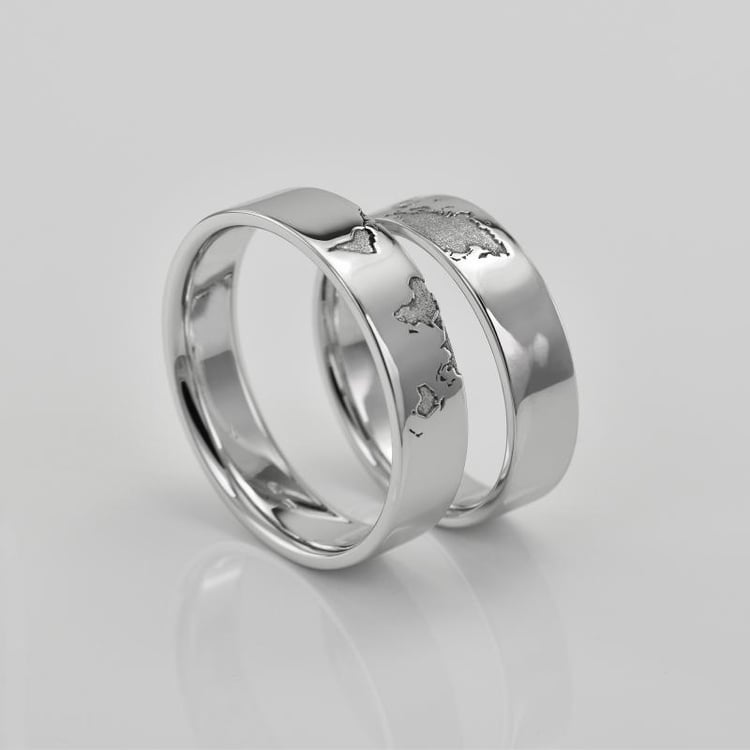 Svadobné obrúčky z platiny s gravírom zemeguľe a diamantom 76587