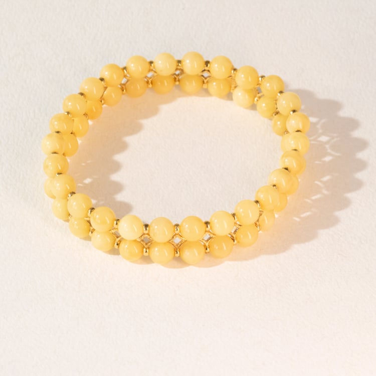 Strieborný pozlátený náramok s krémovo žltými jantármi Nordica 101122