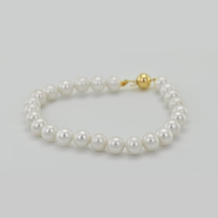 Náramek z bílých perel 23230