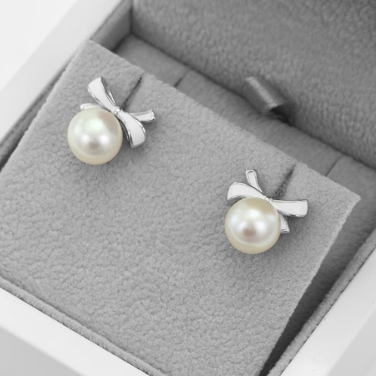 Perlové napichovacie náušnice s enamelovými mašličkami Isabela 50389