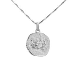 Zlatý prívesok so symbolmi znamenia zverokruhu Rak