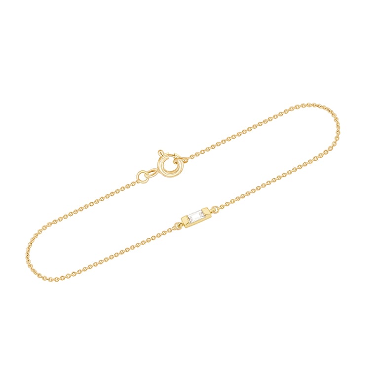 Minimalistický zlatý náramok s bielym zafírom