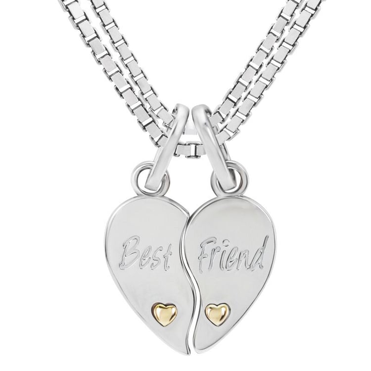 Dve polovice strieborných srdc s nápisom Best Friend