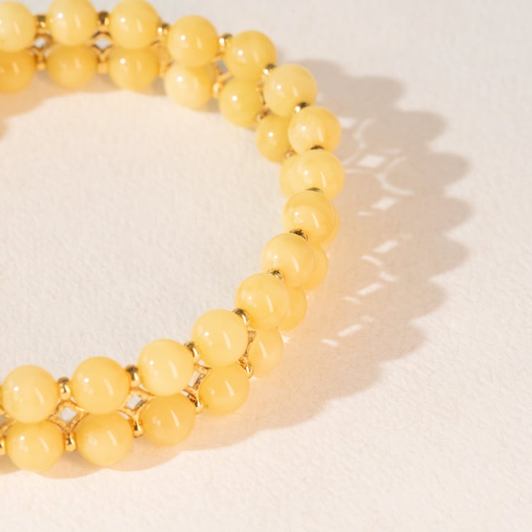 Strieborný pozlátený náramok s krémovo žltými jantármi Nordica 101120