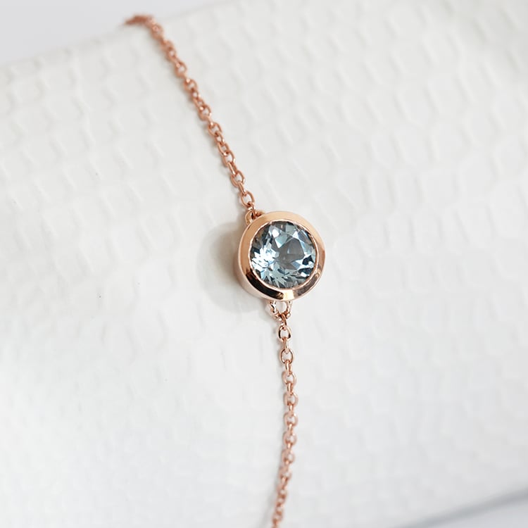 Zlatý náramok s okrúhlym akvamarínom Rollie 117025