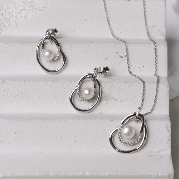 Kolekcia strieborných šperkov s perlami a bielymi topásmi 164070