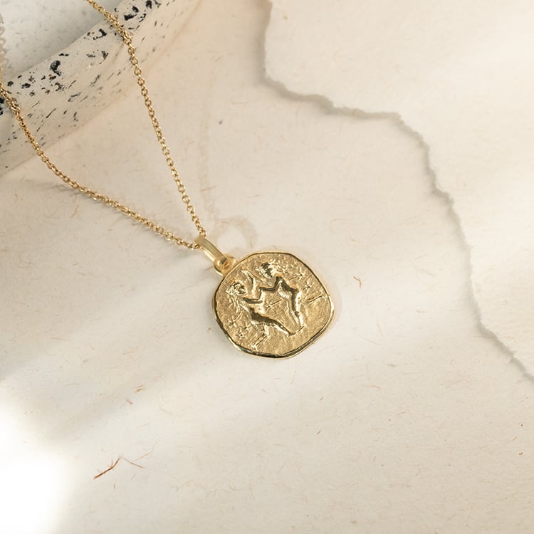 Zlatý prívesok so symbolmi znamenia zverokruhu 143633