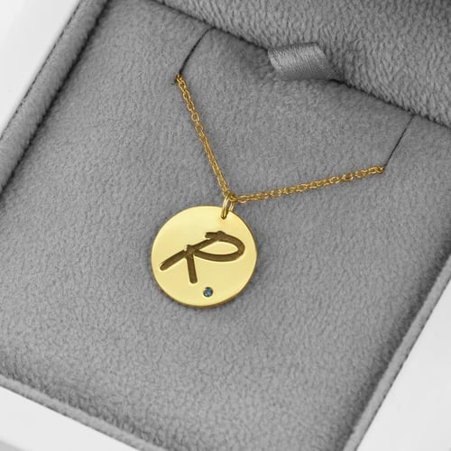 Zlatý prívesok s modrým diamantom a gravírom písmena Rei